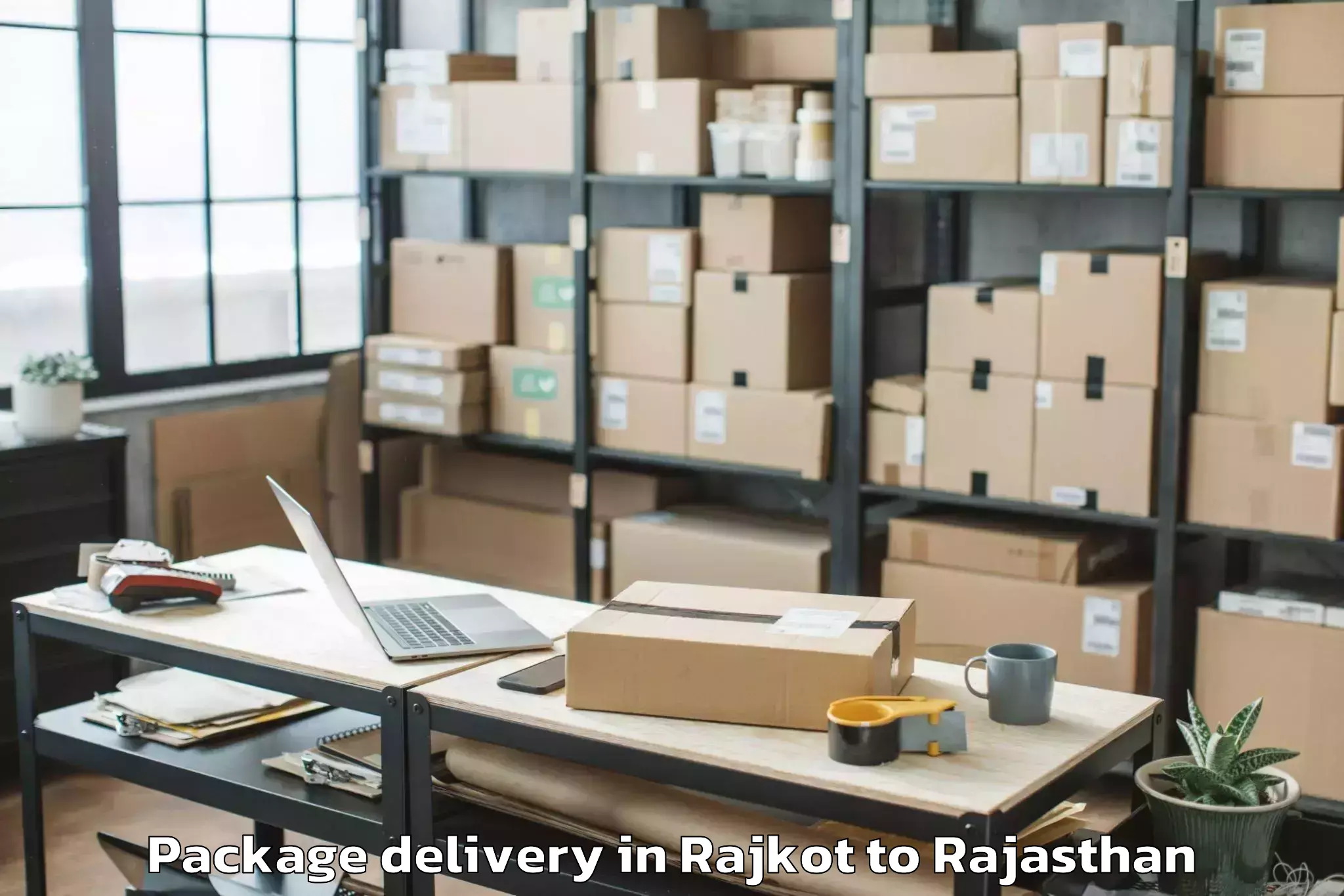 Book Rajkot to Indergarh Package Delivery